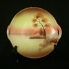 Meito China 8" handled plate with hand painted cottage on lake scene