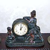 Bog oak clock and candlesticks