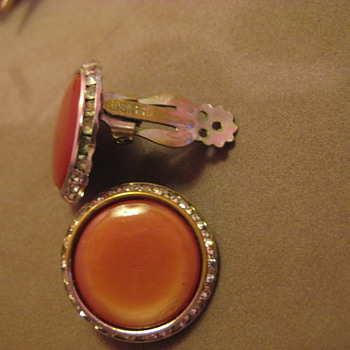 Signed LISNER earrings, channel rhinestone with red/brown center