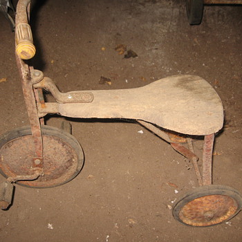 metal tricycle with wooden seat