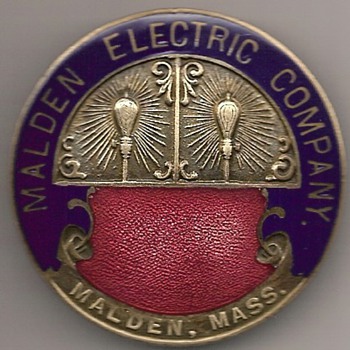 A Couple of Employee Badges