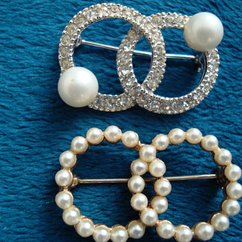 Two brooches