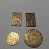Four gold coins 