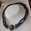 A 2-rows Eye Agate bead necklace with a Micro Mosaic locket . One of my favorites!