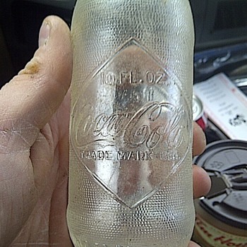What is the age and value of this Coke bottle