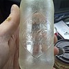 What is the age and value of this Coke bottle