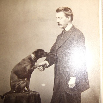 CDV of man with well trained dog