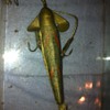 Old fishing lure. feels like paper or paper mache?