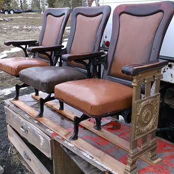 Rows of 3 ornate Premium Theater seats