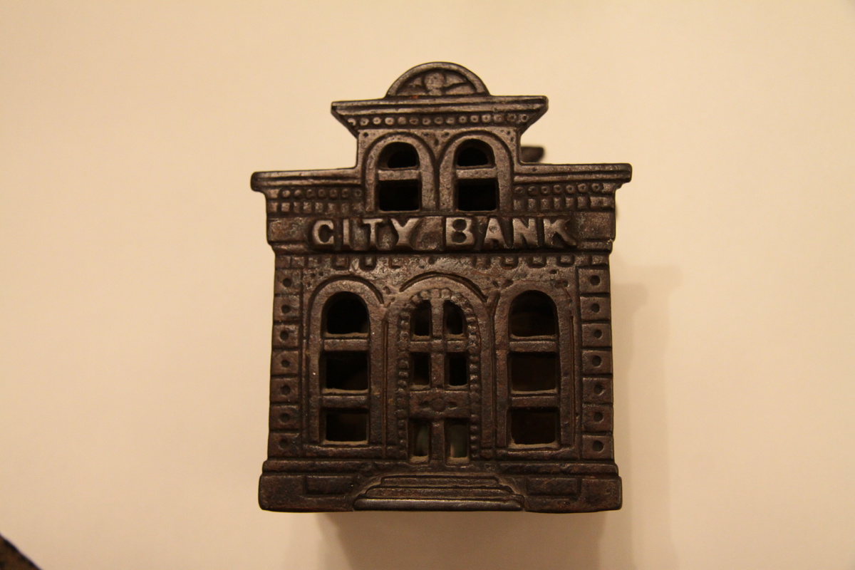 cast iron coin bank Collectors Weekly