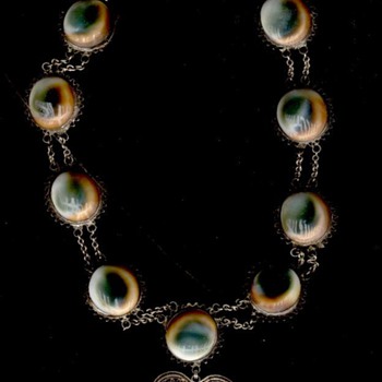 What is this stone? and What ethnicity is this necklace?  Anyone???