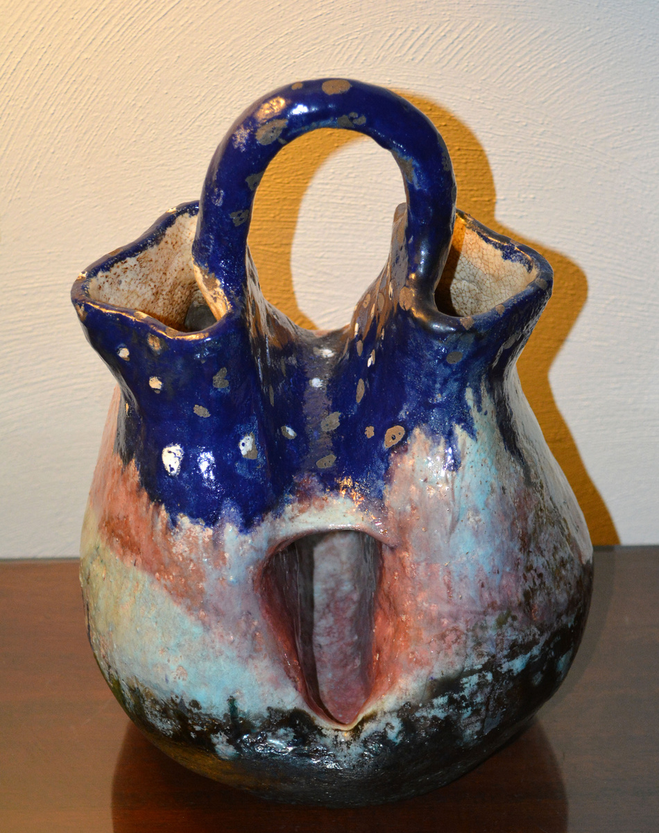 Strange shaped vase.....What is the hole for?? Collectors Weekly