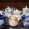 close-up of one shelf of mustard pots