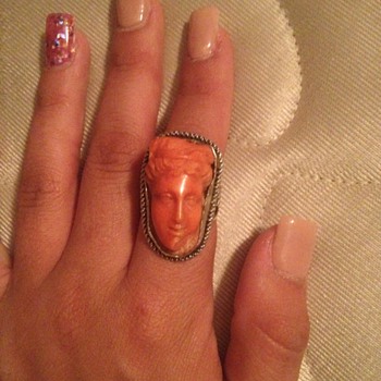 Carved coral and silver ring