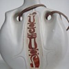 Carved Pottery hanging decanter/flask