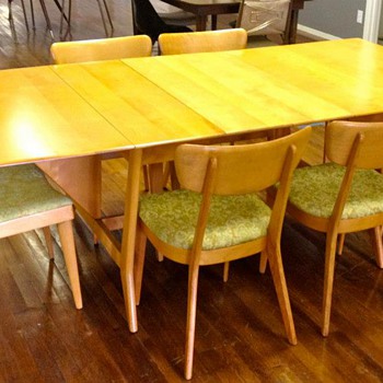 Heywood Wakefield "Harmonic" Drop Leaf Table with 2 leaves and 6 chairs.