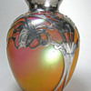 Wondering who made this Bohemian vase? Silver by La Pierre.