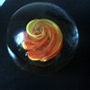 Large Glass Paperweight ORANGE/YELLOW Ribbon/Swirl MARKED ".S." Any idea what the mark is????