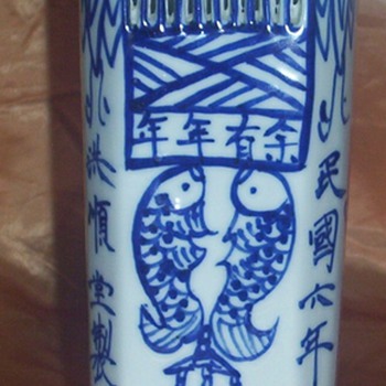 oriental wall pocket with holes on the bottom?