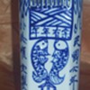 oriental wall pocket with holes on the bottom?