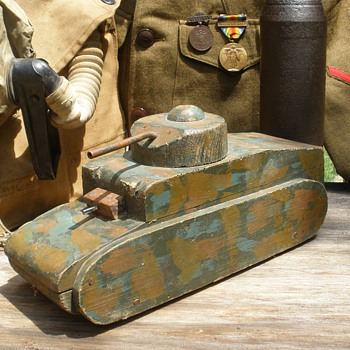 Large wartime pull toy, possibly home made, custom comoflouge. 