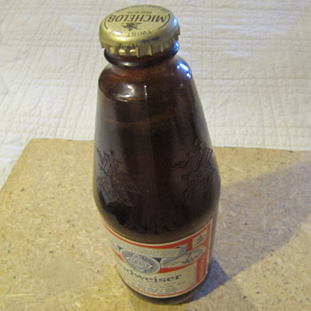 1985 bud bottle with beer and Michelob cap