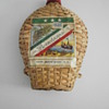 Vintage weaved cane bamboo bottle