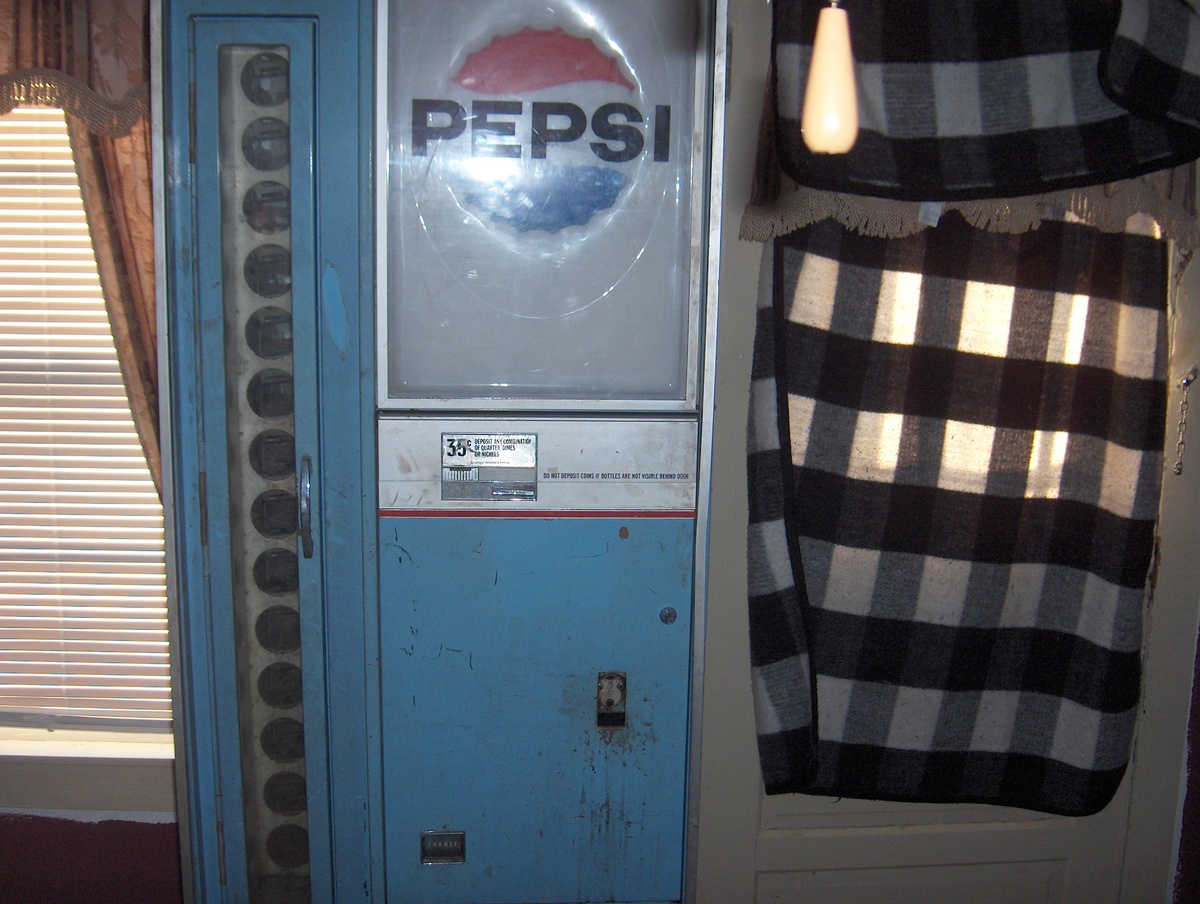 old pepsi machine it took 35 cent machine holds the 16 oz glass bottles