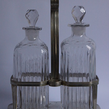 A Decanter Stand with Mould Blown Decanters.