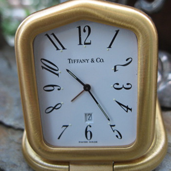 Tiffany is timeless.... so keep time by Tiffany.  My mini travel/desktop man's clock. 