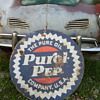 Old oil sign and bicycle.
