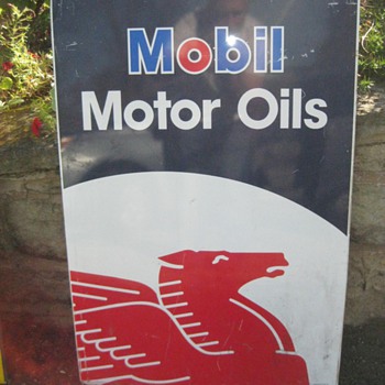 Mobil Motor Oils and Pennzoil signs
