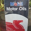 Mobil Motor Oils and Pennzoil signs
