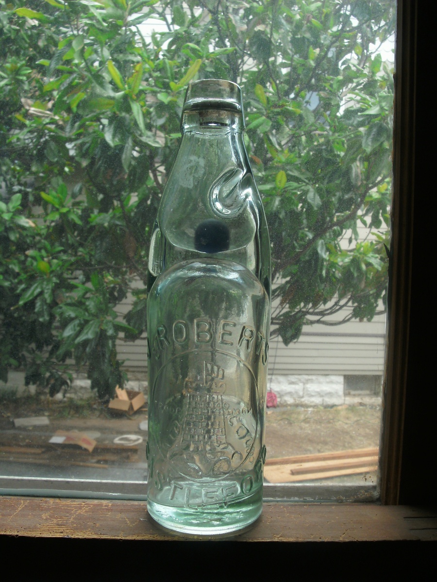 Bottle with Marble Collectors Weekly