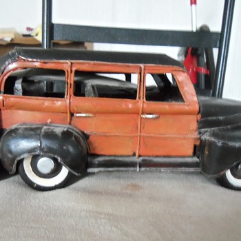 woody cast iron with surf boards on back