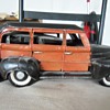 woody cast iron with surf boards on back