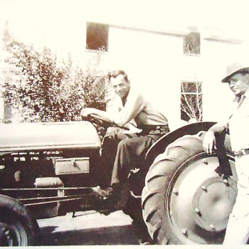 Photograph for ThriftyGypsy on Ford tractors,  dad and grandfather on our farm with I think 1940's tractor!
