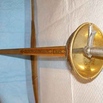 Here is a sword-that was my dad's-I thought it was gone-but we found it lastnight! 