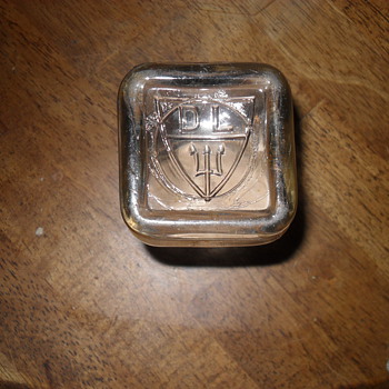 Small Glass jar with embossing on the bottom? - Bottles