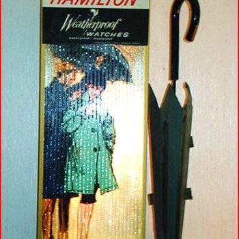 Lighted, motorized vintage "Hamilton Weatherproof Watch". - Signs