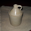 Vintage white whiskey jug