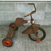 Unknown tricycle with skirted fender.