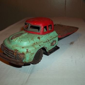 VINTAGE PRESSED TIN FRICTION DRIVE TRUCK