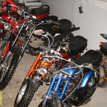 Minibikes at a long closed cycle & engine store in S. Minnesota - Motorcycles