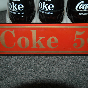 Coke glass sign