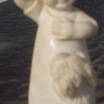Carved Ivory figure, signed?