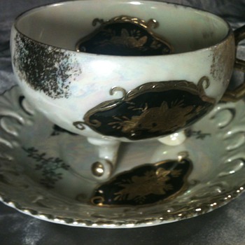 Gold and black Rainbow glass china cup and saucer  - China and Dinnerware