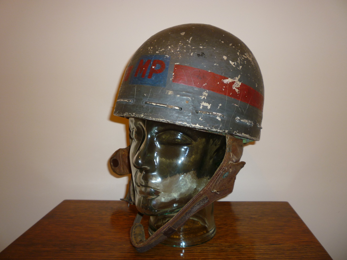 British WW11 Papier Mache and cloth MP helmet. Collectors Weekly