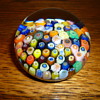 Clichy millefiori paperweight with a close pack of crafted flowers 