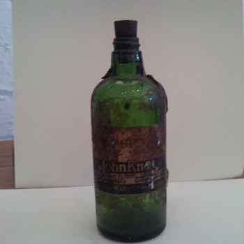 Dark Green Chemist Bottle with original lable, - Bottles